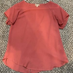 Pink blouse with slit in the back